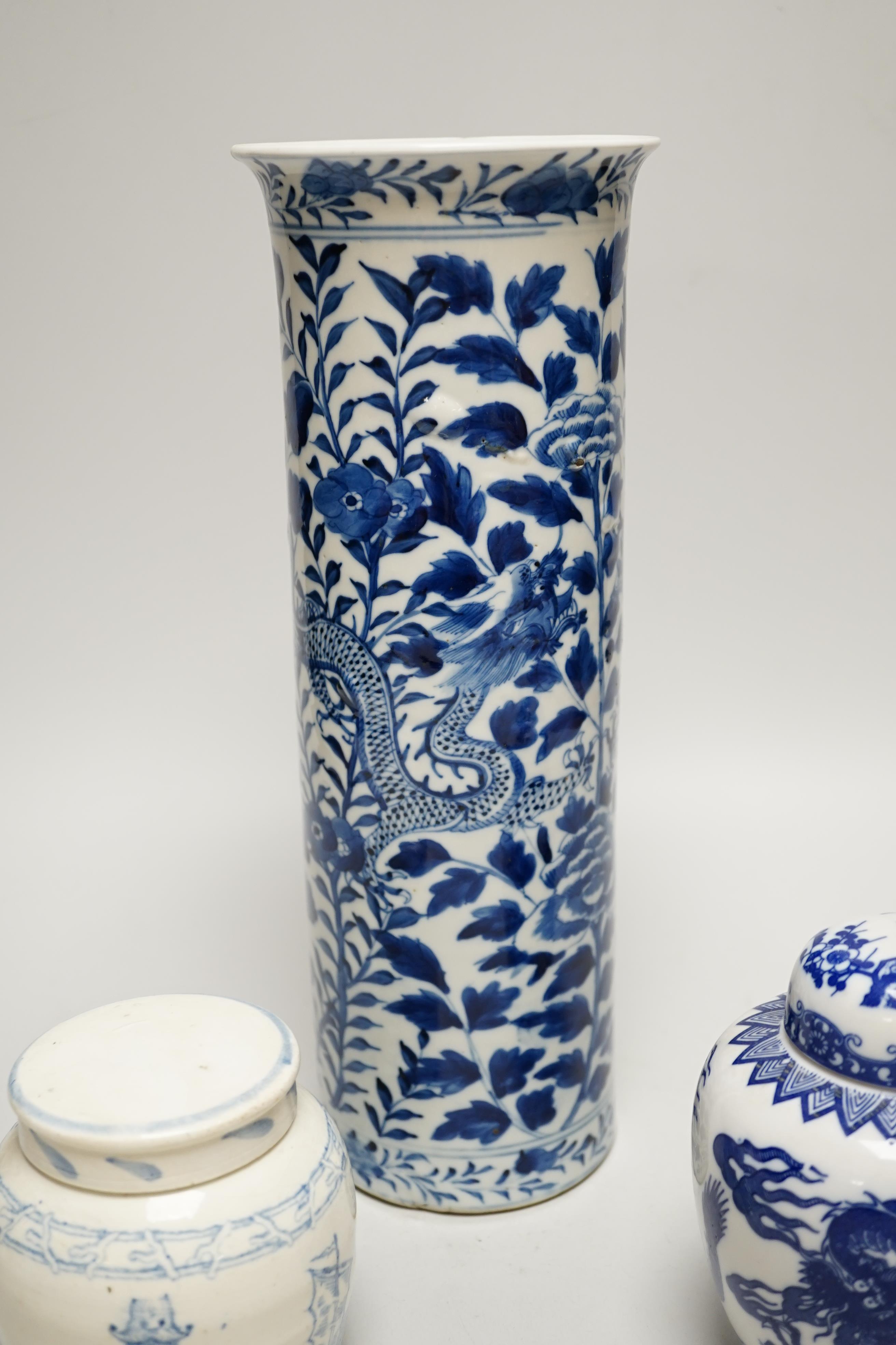 An early 20th century Chinese vase together with two small jars with covers, highest 31cm